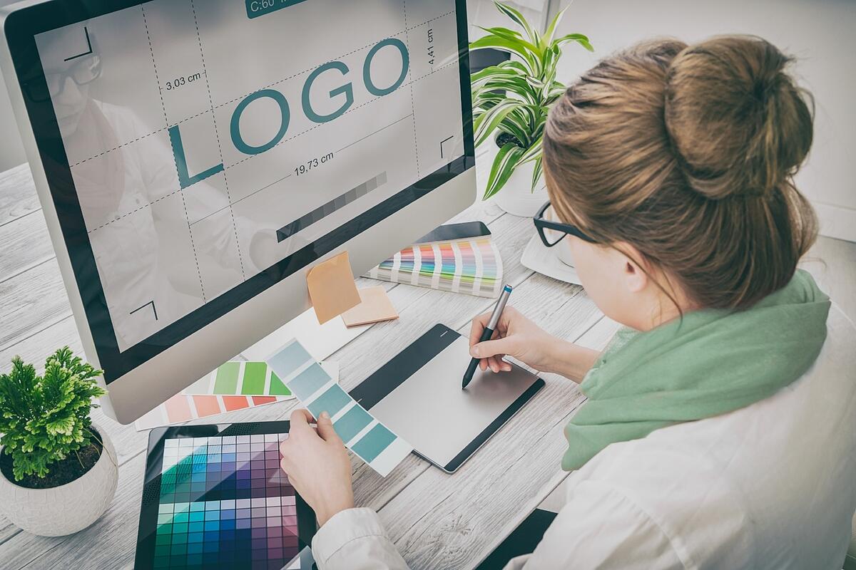 Woman creating logo